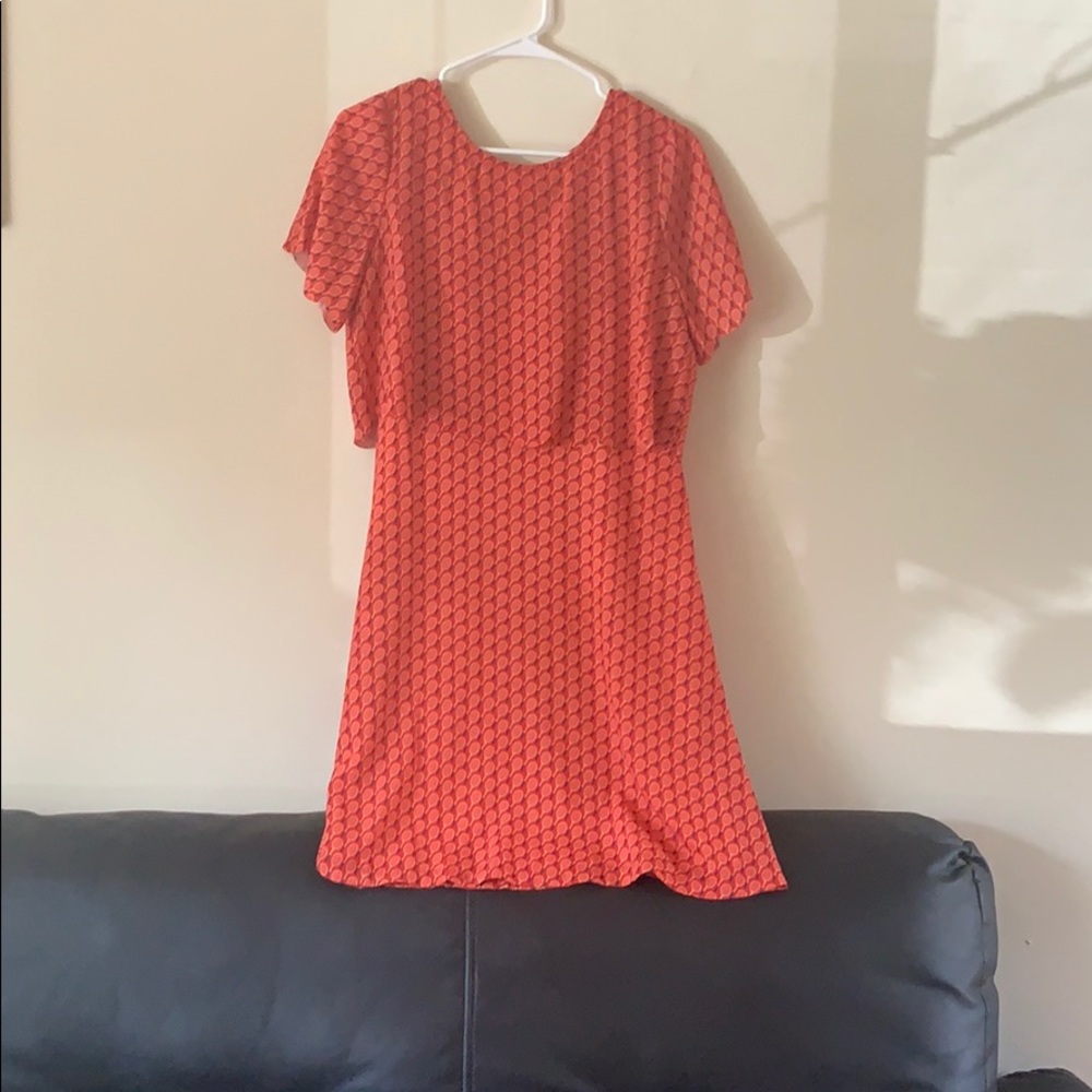 Red dress with tennis rackets